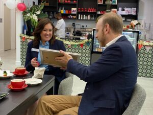 ACCPA CEO Tom Symondson presents certificate to Palm Lake Care Service Manager Kelly Roberts